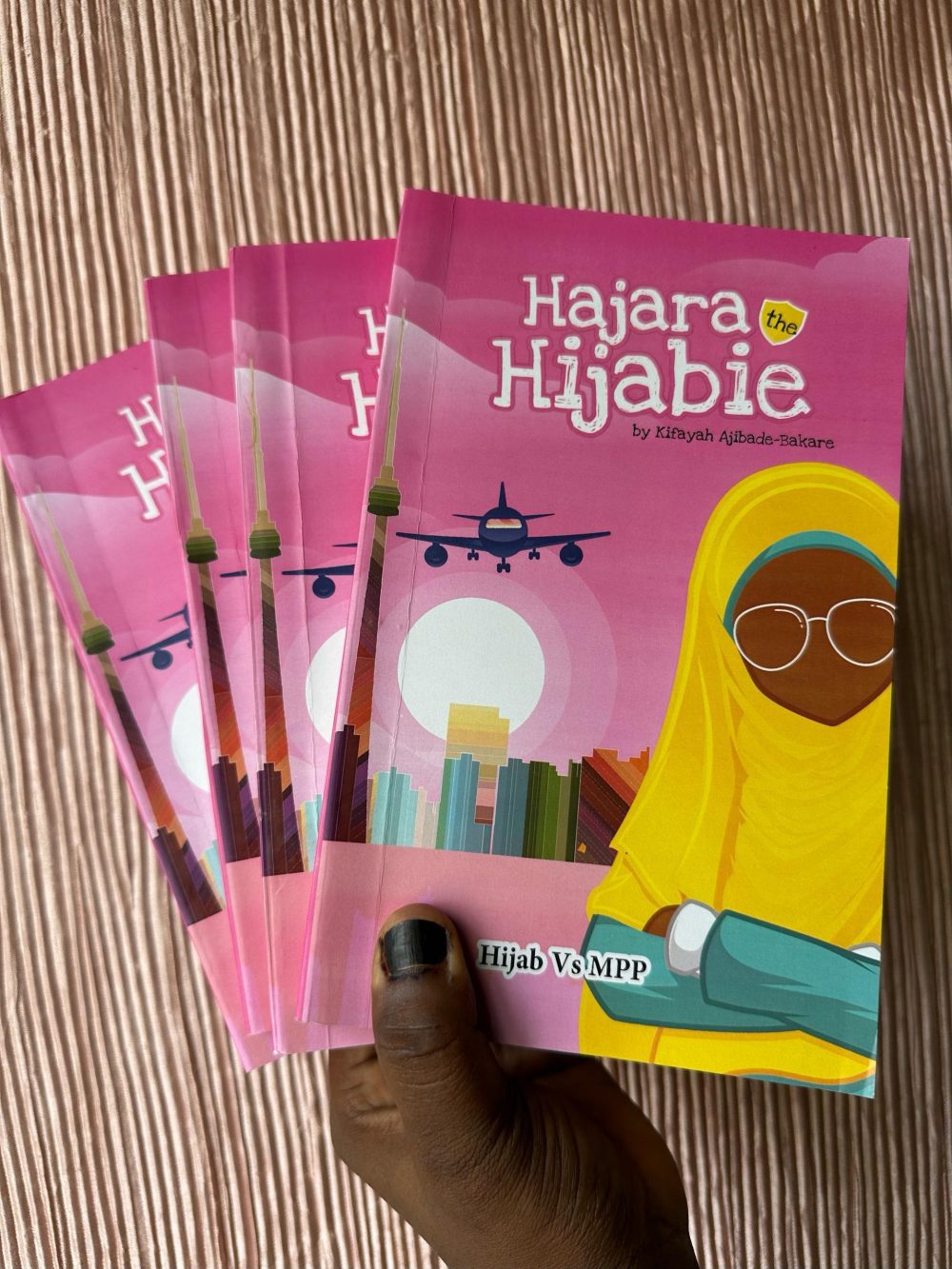 "Hajara the Hijabie book cover by Kifayah Ajibade-Bakare – illustrated story of a young Muslim girl wearing hijab"